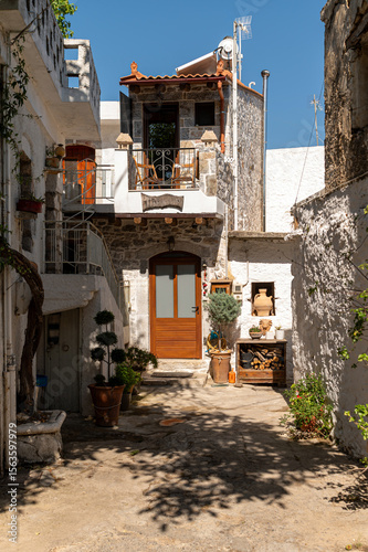 Fototapeta Naklejka Na Ścianę i Meble -  Explore the charming streets of Krasi village in Crete, Greece on a sunny day
