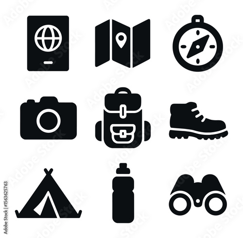 Travel Essentials Icons. Solid, filled icons set of travel essentials: passport, map, compass, camera,