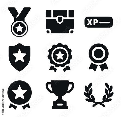 Gaming Rewards Icons. Solid, filled icons set of competitive gaming rewards: gold medal, prize chest, XP bar,