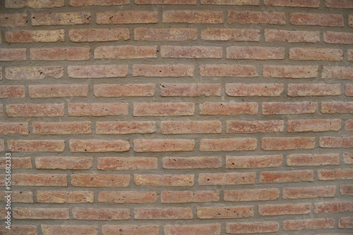 
Exposed brick wall with joints taken with uniform texture