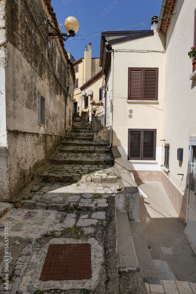 Obraz premium A small street in Oppido Lucano, a rural town in the province of Potenza in Italy.