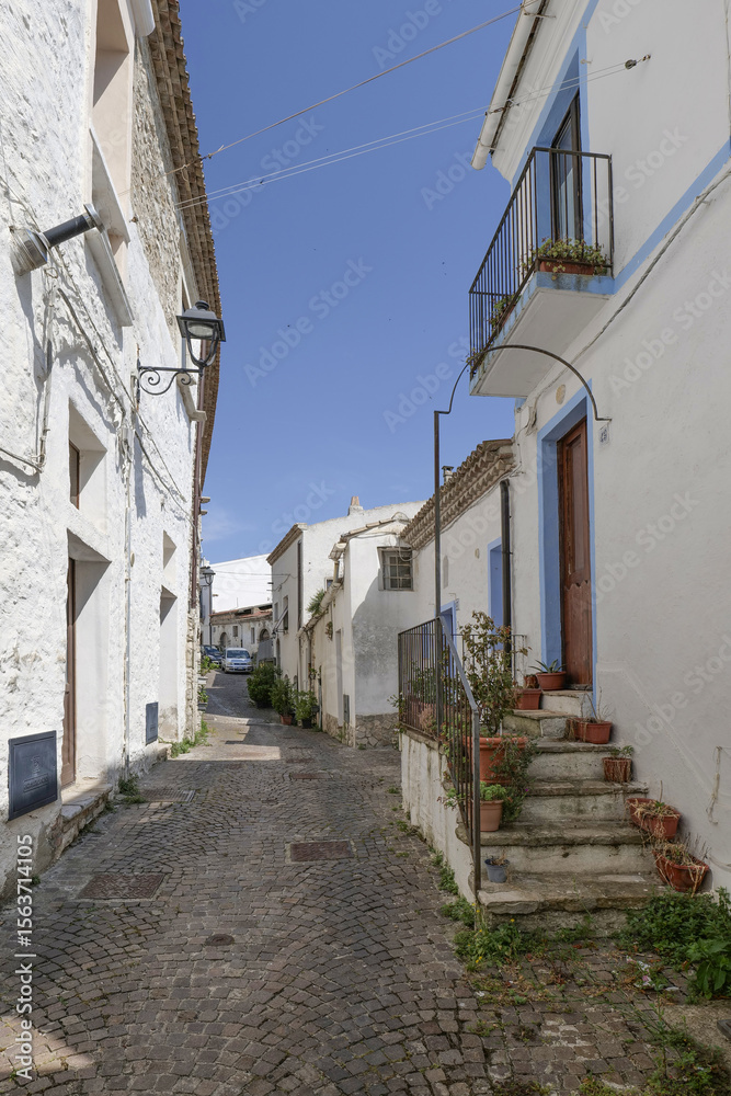 Naklejka premium A small street in Oppido Lucano, a rural town in the province of Potenza in Italy.