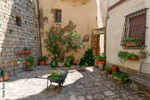 Fototapeta Naklejka Na Ścianę i Meble -  A small street in Oppido Lucano, a rural town in the province of Potenza in Italy.