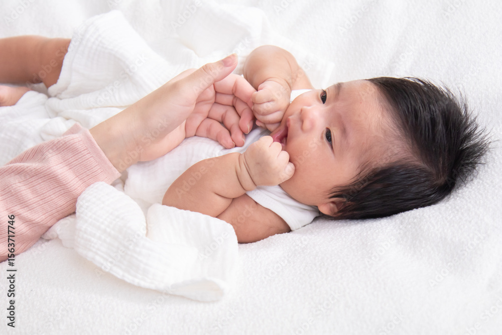 Mother, baby, newborn, family, love expressed in a quiet moment of feeding as infant looks up with eyes contact, trustful, building emotional bond, calmness, routine, nurturing care, and love support Mother, baby, newborn, family, love expressed in a quiet moment of feeding as infant looks up with eyes contact, trustful, building emotional bond, calmness, routine, nurturing care, and love support
