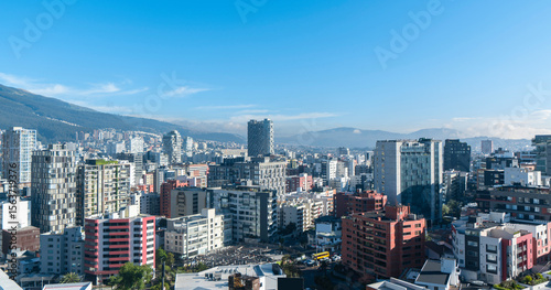 modern buildings in the northern part of Quito in the morning with a blue sky in the background