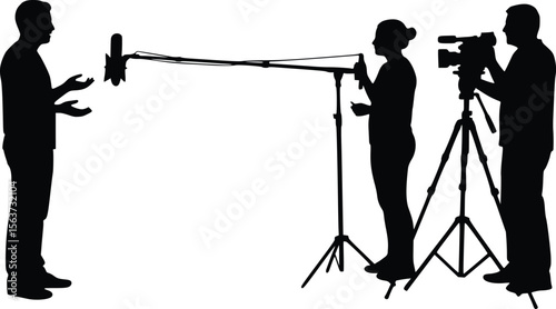 Silhouette of a video production scene with a speaker, camera operator, and boom microphone holder