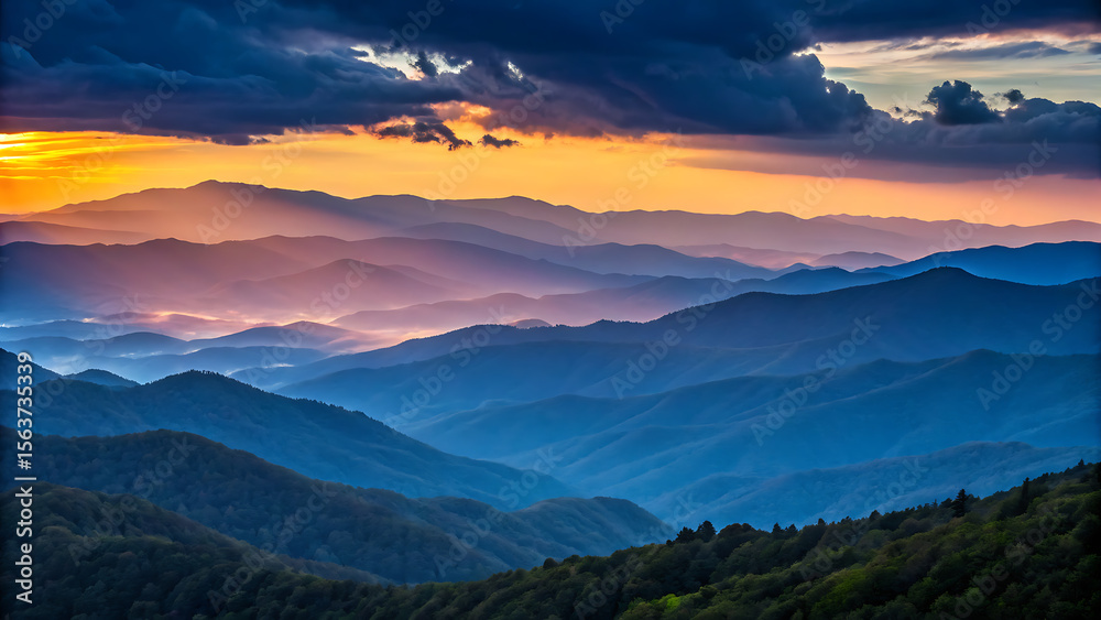 Fototapeta premium Dramatic mountain layers bathed in the warm glow of sunrise with dark stormy clouds above