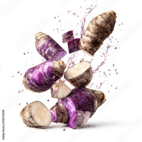 Vibrant Purple Taro Root Slices Splashing in Water Fresh Healthy Vegetable Food