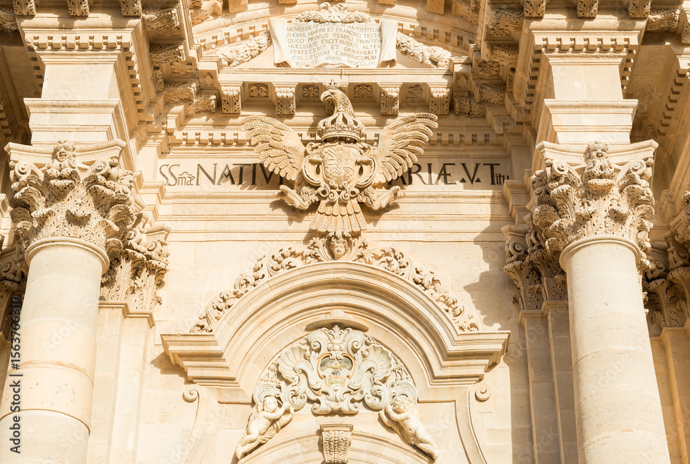 Obraz premium Detail of the facade of the Cathedral of Syracuse, located in the historic center on Ortygia Island, Sicily, Italy