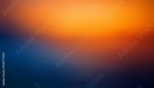 blurry warm toned gradient featuring deep orange and navy blue hues in soft transition
