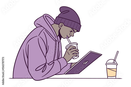 A young person wearing a purple beanie and hoodie drinks from a cup while working on a laptop with another drink nearby