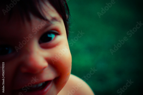 Close up of a Mexican baby, smiling