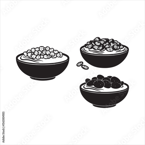 Three black bowls filled with various grains and legumes