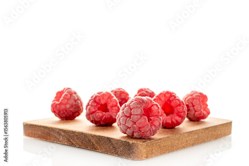 Fresh sweet raspberries isolated on white background, macro.	
