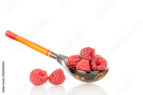 Fresh sweet raspberries isolated on white background, macro.	
