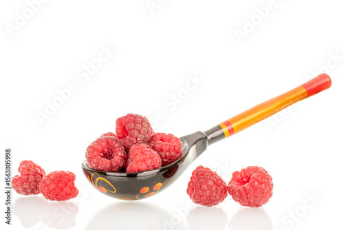 Fresh sweet raspberries isolated on white background, macro.	
