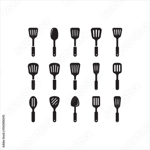Collection of kitchen utensils featuring spatulas and serving spoons