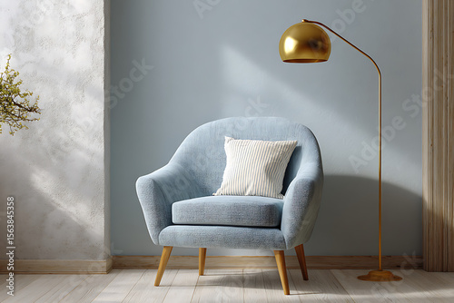 Cozy blue armchair with striped pillow and golden arc lamp image