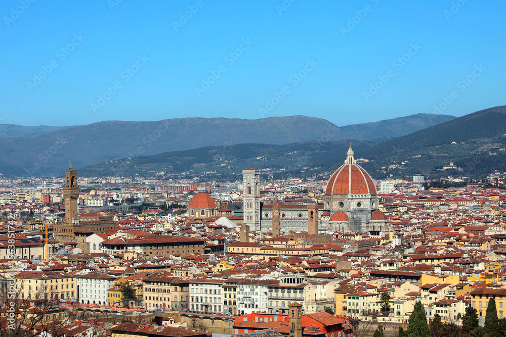 Fototapeta premium Panoramic of City of Florence in Central Italy with many famous historic buildings and Palace and Cathedral