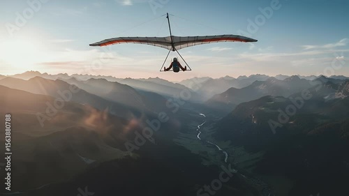 Hang Gliding Over Mountain Valley at Sunrise Adventure Slow Motion