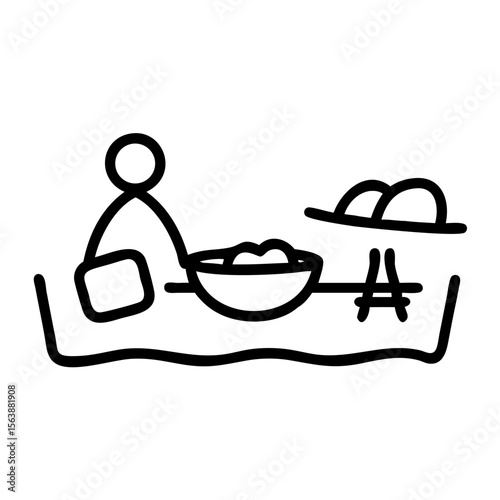 Child playing in sandbox icon in black line style on white