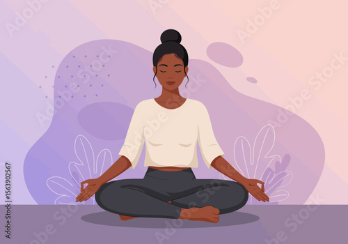 Woman in lotus pose seated on a mat with eyes closed in meditation against an abstract purple backdrop