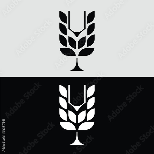 An abstract black and white logo design featuring a stylized wheat stalk, isolated on a split gray and black background