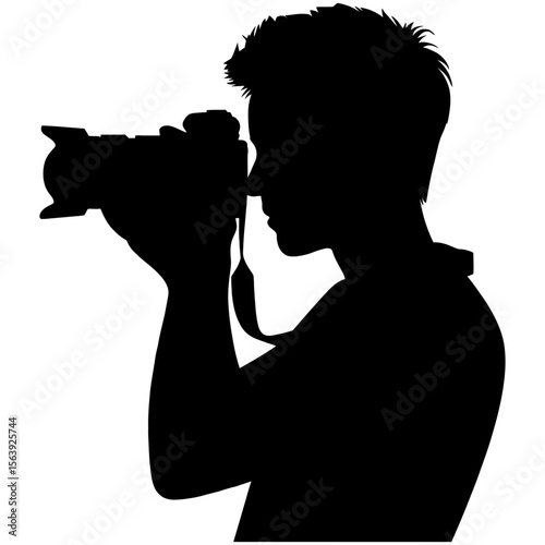 Silhouette of a photographer taking a picture shot