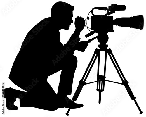 Silhouette of a videographer with camera on tripod
