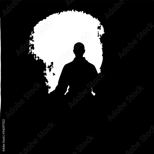 silhouette of a man in yoga pose