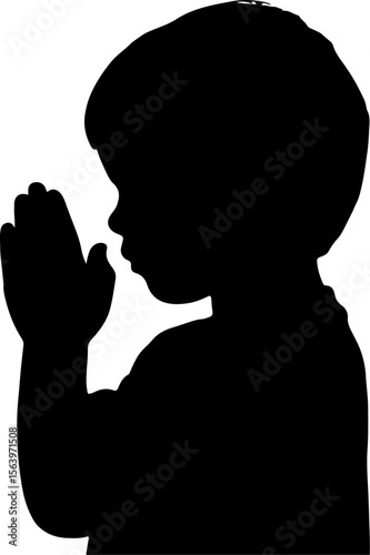 silhouette of a boy praying