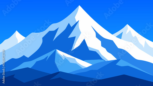 Majestic snow capped mountain range under a clear blue sky