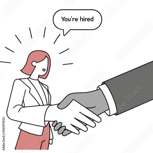 A smiling woman in a suit shakes hands with a person in a suit signifying a successful job offer and employment