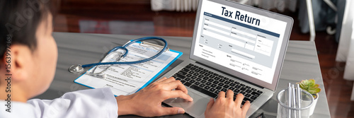 Online tax return form for submitting individual income tax return form brisk on the internet website. Government web for tax payment and return. Taxation technology concept. photo
