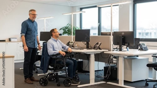 Wallpaper Mural Inclusive Workplace: Man in wheelchair at desk, colleague assisting in modern office setting Torontodigital.ca