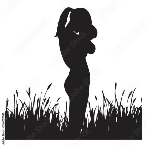 Silhouette of a woman with a ponytail standing in tall grass
