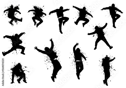 Dynamic Silhouettes of Acrobatic Figures Performing Energetic Jumps and Leaps with Splattered Ink Effects Representing Motion and Action