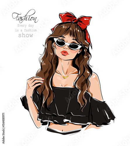 Hand drawn beautiful young woman in sunglasses. Stylish girl with bow on her head. Pretty lady. Fashion woman look. Sketch. Vector illustration.