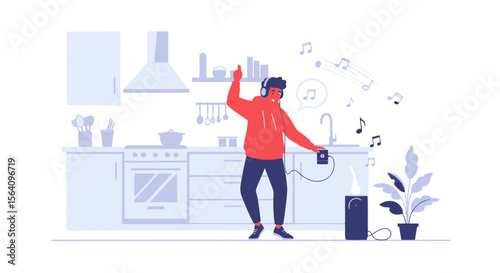 Man Enjoying Music With Headphones And Dancing In The Kitchen At Home