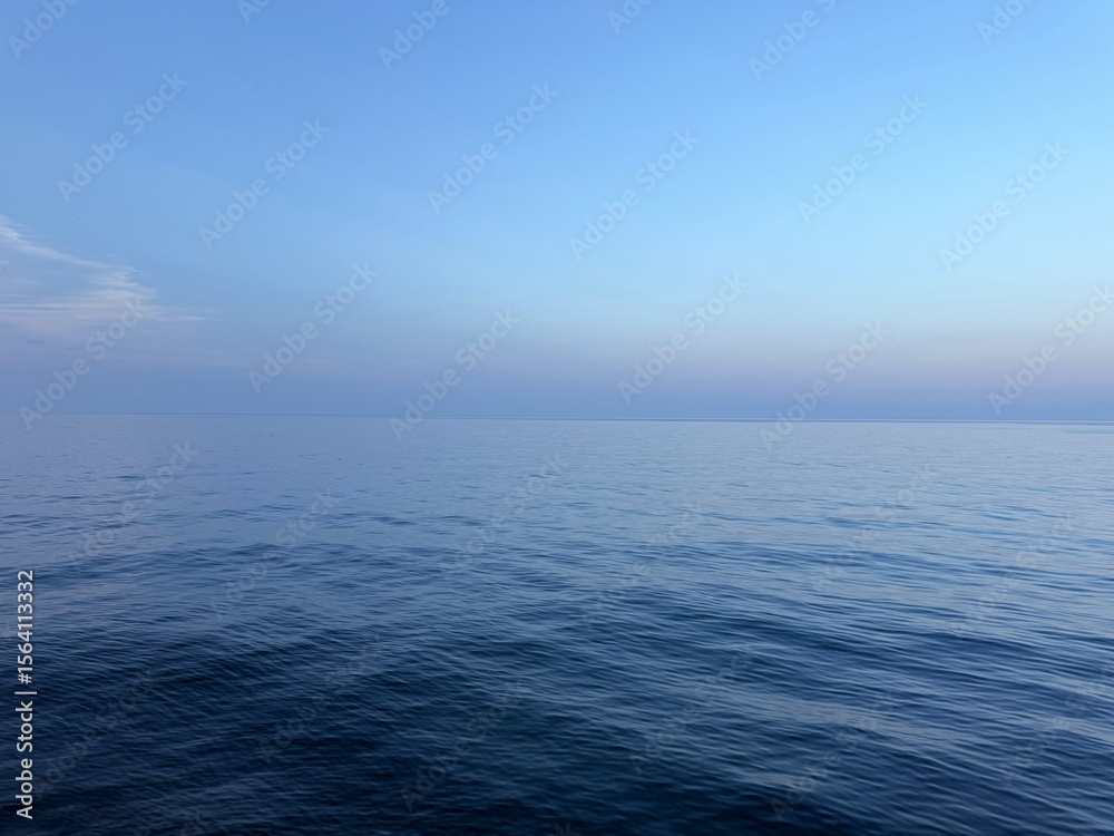custom made wallpaper toronto digitalSea calm blue water and blue sky.
