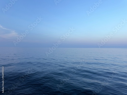 Wallpaper Mural Sea calm blue water and blue sky. Torontodigital.ca