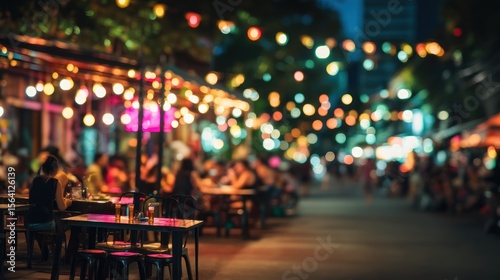 Nightlife illuminated street dining urban scene bokeh lights