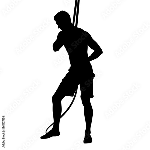 Silhouette of male climber practicing knot tying, technical skill training