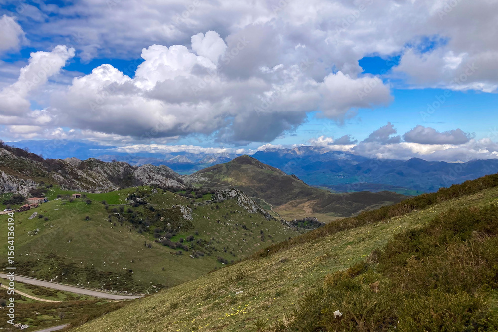 Obraz premium The picturesque Covadonga Lakes nestled in the Picos de Europa mountains, Asturias, Spain, offer breathtaking natural beauty and tranquility