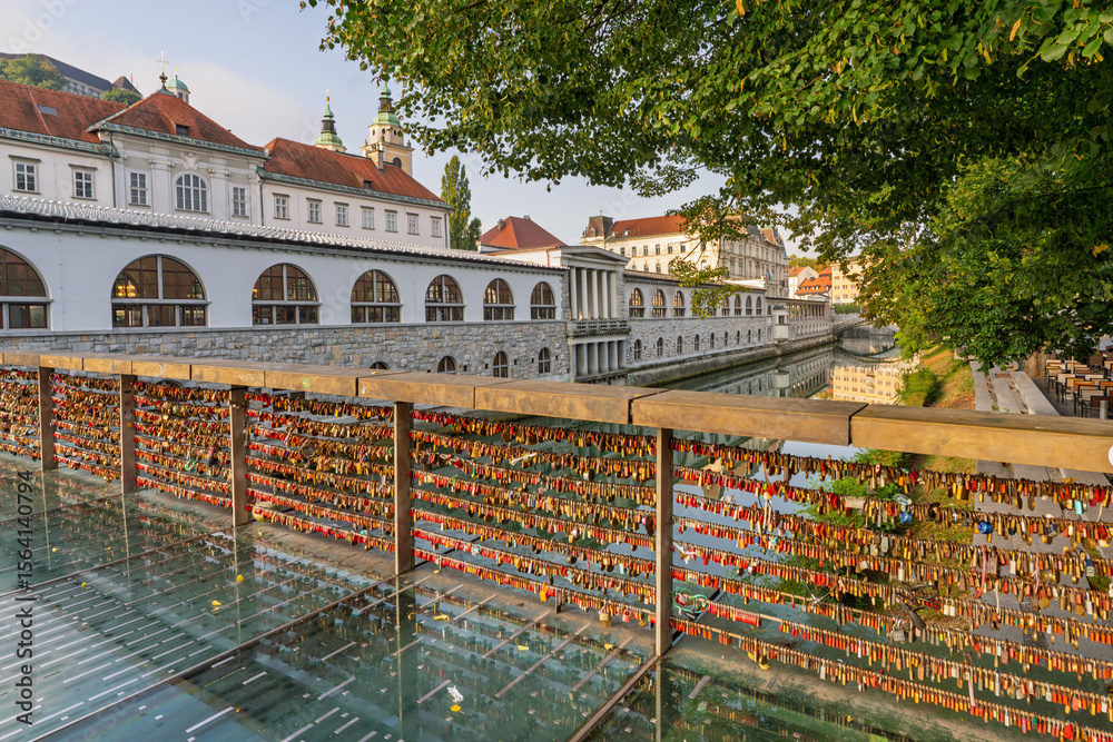 Fototapeta premium Love locks on Butcher’s Bridge in Ljubljana at sunrise