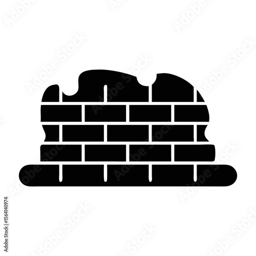 An artistic silhouette of a partial brick wall with an irregular top