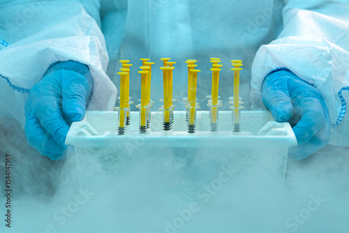 Syringes ready for vaccination in a cold storage room