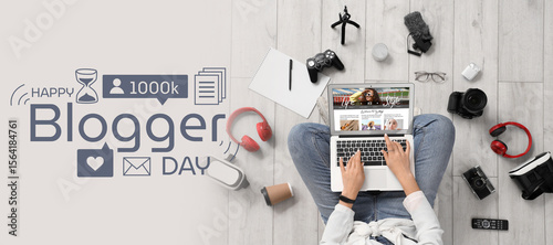 Female blogger using laptop...