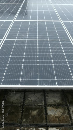 solar panels in a rain day at vertical composition video with sound
