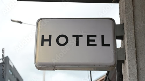 Hotel sign at the hotel entrance. Symbol of hotel. 